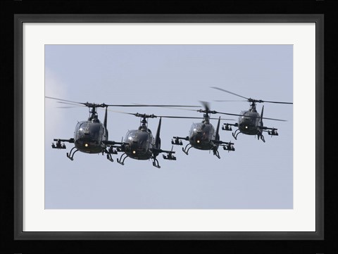 Framed Serbian Air Force Soko SA-342L GAMA choppers in flight over Serbia Print