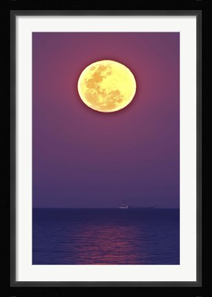 Framed Thunder's Moon and its reflection above the water Print
