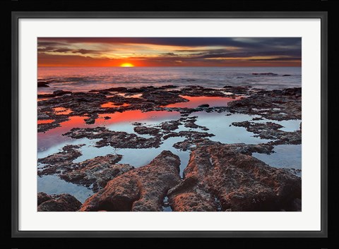 Framed Tidal pools reflect the sunrise colors during the autumn equinox Print