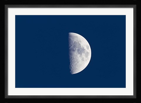 Framed First quarter moon taken near sunset with sky still bright in twilight Print