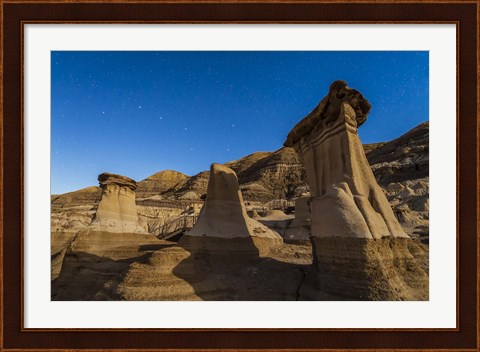 Framed Stars over the hoodoos in the Red Deer River valley, Alberta, Canada Print