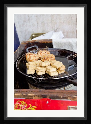 Framed China, Shanghai. Village of Zhujiajiao. Homemade snacks cooked in wok. Print