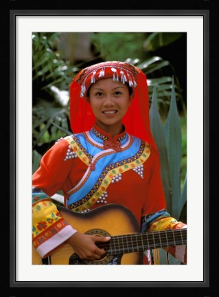 Framed Ethnic Dancer Playing Guitar, Kunming, Yunnan Province, China Print