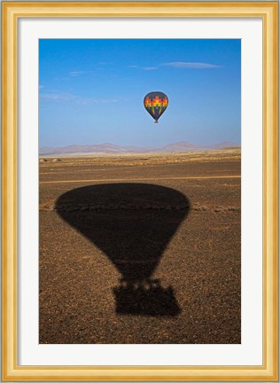 Framed Hot air balloon casting a shadow over Namib Desert, Sesriem, Namibia Print