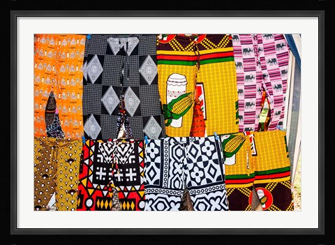 Framed Africa, Angola, Benguela. Bright colored pants for sale at local shop. Print