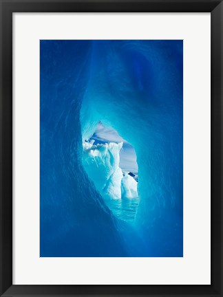 Framed Antarctica, Iceberg framed in arch of another in Wilhelmina Bay. Print