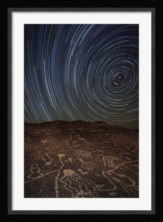 Framed Star trails at an ancient petroglyph site near Bishop, California Print