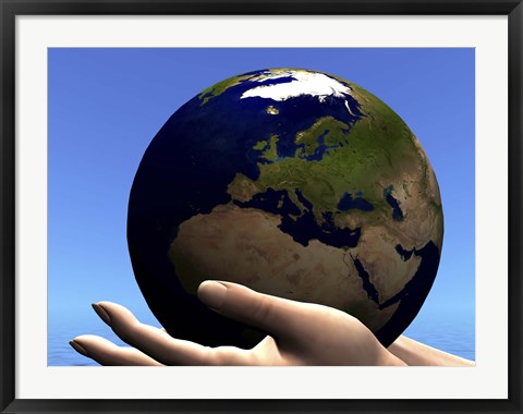 Framed planet Earth is held in caring human hands Print