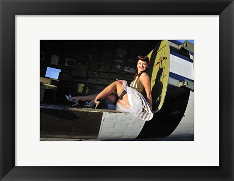 Framed Sexy 1940&#39;s style pin-up girl sitting inside of a C-47 Skytrain aircraft Print