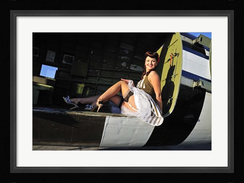 Framed Sexy 1940's style pin-up girl sitting inside of a C-47 Skytrain aircraft Print