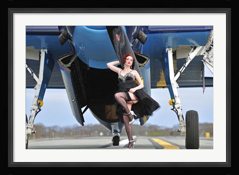 Framed 1940's style pin-up girl in cocktail dress posing in front of a TBM Avenger Print