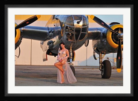 Framed Sexy 1940's pin-up girl in lingerie posing with a B-25 bomber Print