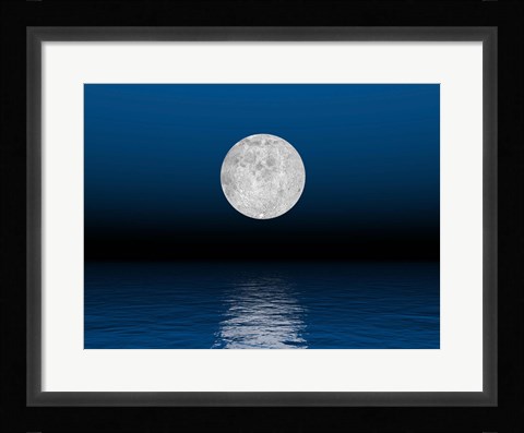 Framed Beautiful full moon against a deep blue sky over the ocean Print