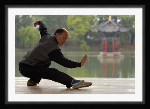 Framed Man Doing Tai Chi Exercises at Black Dragon Pool with One-Cent Pavilion, Lijiang, Yunnan Province, China Print