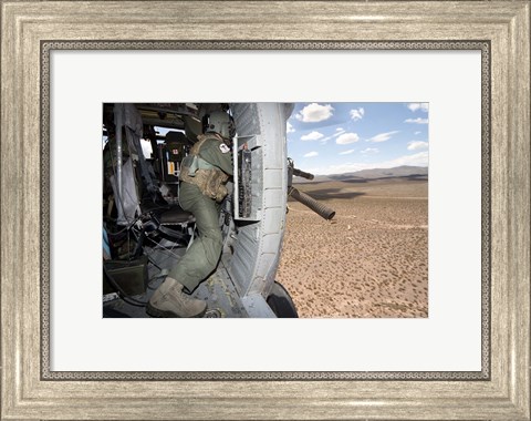 Framed HH-60G Pave Hawk gunner fires his GAU-17 machine gun Print