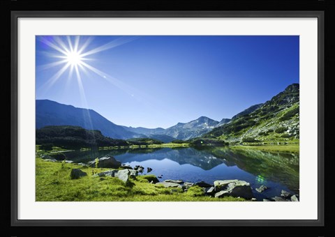 Framed Muratov Lake against blue sky and bright sun in Pirin National Park, Bulgaria Print