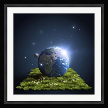 Framed Planet Earth lying on a green lawn with moon and stars Print