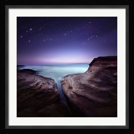 Framed Two large rocks in a sea, against starry sky Print