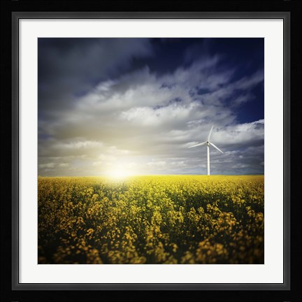 Framed Wind turbine in a canola field against cloudy sky at sunset, Denmark Print