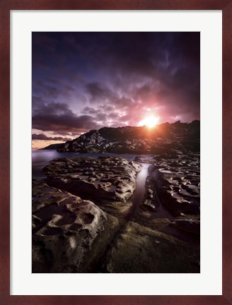 Framed Rocky shore and tranquil sea against cloudy sky at sunset, Sardinia, Italy Print