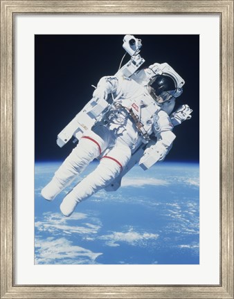 Framed AstronautTaking a Spacewalk Print