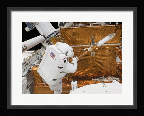 Framed Astronaut works with the Hubble Space Telescope in the cargo bay of Atlantis Print