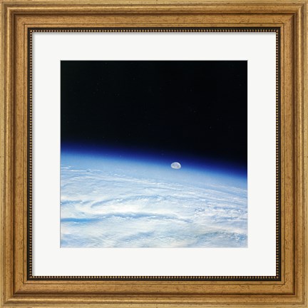 Framed Outer space shot of storm system in early stage of formation with moon in background Print
