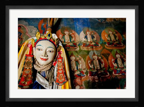 Framed Religious statue infront of Buddha mural at Shey Palace, Ladakh, India Print