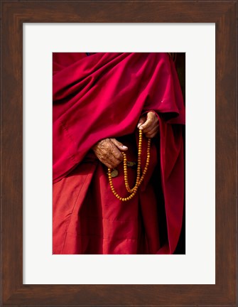 Framed Hands of a monk in red holding prayer beads, Leh, Ladakh, India Print