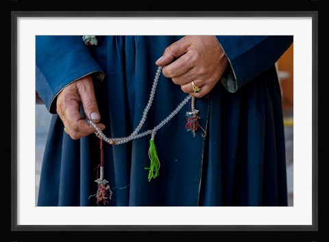 Framed Woman's hands holding prayer beads, Ladakh, India Print