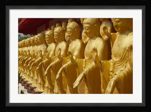 Framed Taiwan, Foukuangshan Temple, Standing gold-colored Buddha statues at a Buddhist shrine Print