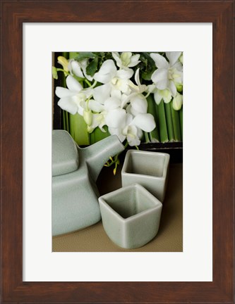 Framed Traditional Thai tea pot and cups with orchid arrangement, Bangkok, Thailand Print
