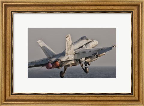 Framed F/A-18C Hornet Taking Off from USS George HW Bush Print