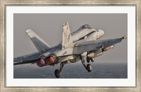 Framed F/A-18C Hornet Taking Off from USS George HW Bush Print