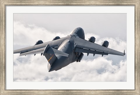 Framed C-17 Globemaster Above the Clouds Print