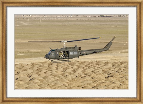 Framed Italian Army AB-205MEP Utility Helicopter Over Shindand, Afghanistan Print