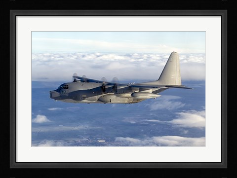 Framed MC-130P Combat Shadow Soars Above the Clouds Print