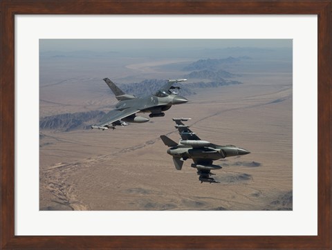 Framed Two F-16&#39;s on a training mission over the Arizona desert Print