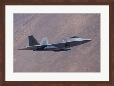 Framed F-22 Raptor on a Training Mission Print