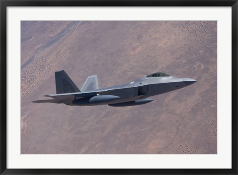 Framed F-22 Raptor on a Training Mission Print