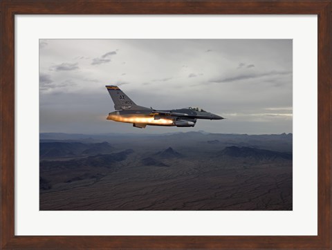Framed F-16 Fighting Falcon Fires an AGM-65 Maverick Missile Print