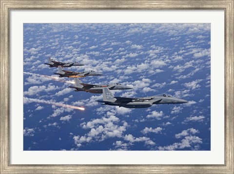 Framed Four F-15 Eagles fly in Formation Over the Pacific Ocean Print