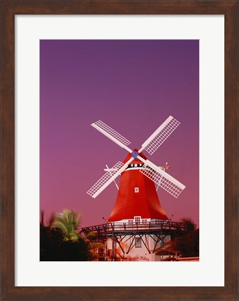 Framed Mill Resort against pink sky, Oranjestad, Aruba Print