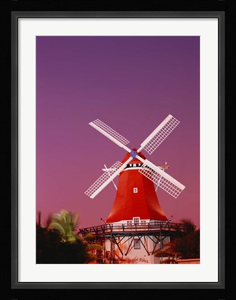 Framed Mill Resort against pink sky, Oranjestad, Aruba Print