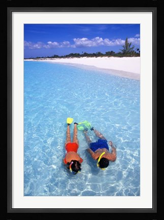 Framed Snorkeling in the blue waters of the Bahamas Print