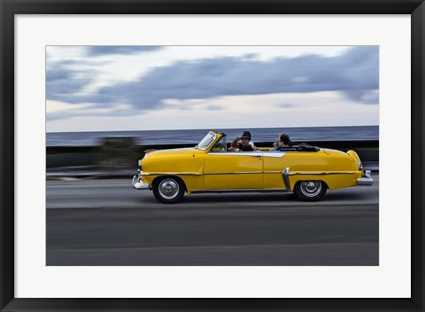 Framed 1950&#39;s era car in motion along the Malecon or seawall, Havana, Cuba Print