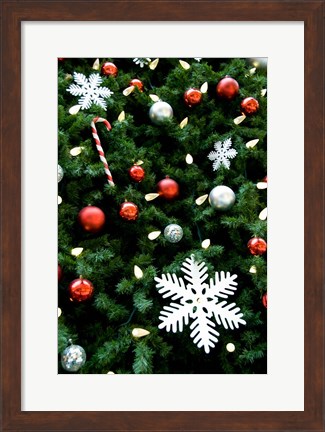 Framed Christmas decorations on tree Print