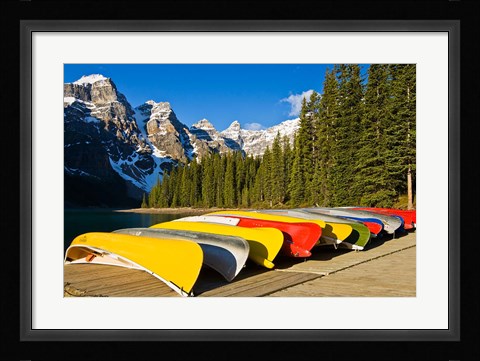 Framed Moraine Lake and rental canoes stacked, Banff National Park, Alberta, Canada Print