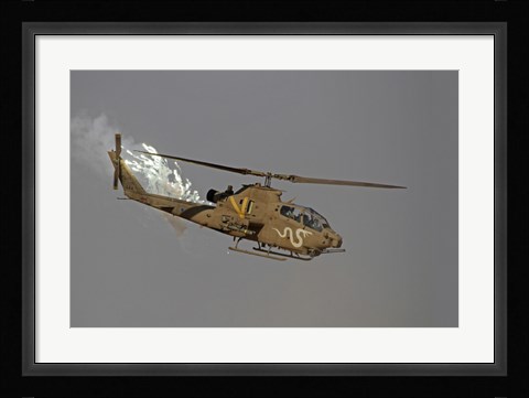 Framed AH-1S Tzefa of the Israeli Air Force dispenses flares Print