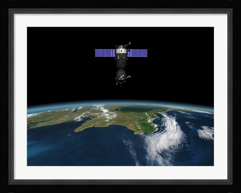 Framed Soyuz TMA-M spacecraft in low Earth orbit Print